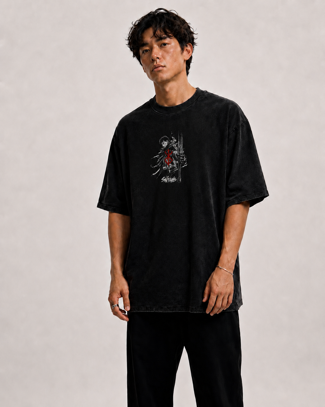 Guts oversized black t-shirt detail shot - DTG print by Saiyans